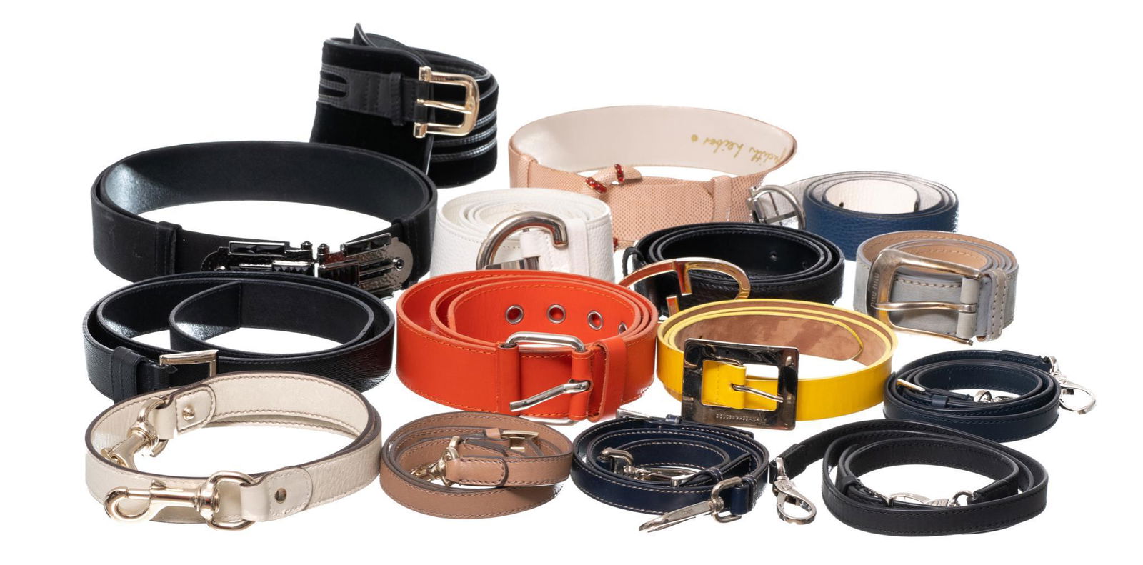 Lot of 13 Designer Belts and Shoulder Straps: Includes: 2 x Dolce & Gabbana, 2 x Judith Leiber, Miu Miu, Ferragamo, 3 x Prada, 3 x Gucci, 3 x Tods Provenance: Property seized by court order from oil & gas entrepreneurs Brian & Kristi Alfaro (San