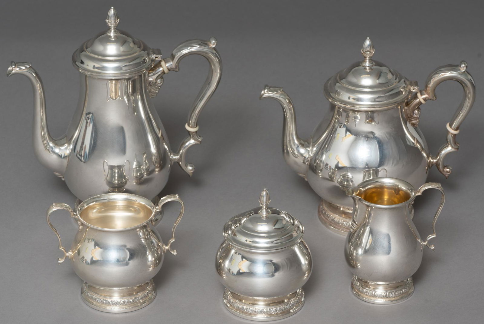 'Prelude' International Sterling Silver Tea Set: Hallmarked: International Sterling Prelude, weight: 79.39 ozt., measures: 11 x 10" (teapot) Provenance: Property from the former Charlott's Antiques, est. 1966 (San Antonio, Texas)