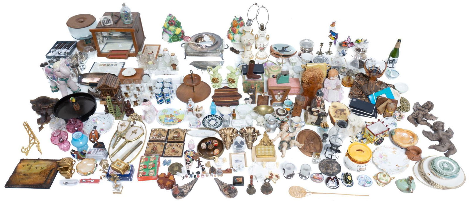 Lot of Approx. 100 Misc. Home Goods: Lot of approx. one hundred pieces of misc. home goods, to include books, decorative objects, mirrors, etc. Provenance: The Estate of Andy and Bea Copeland In-house shipping and delivery is available o