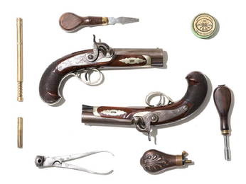 Pair Derringer cap and ball pistols.