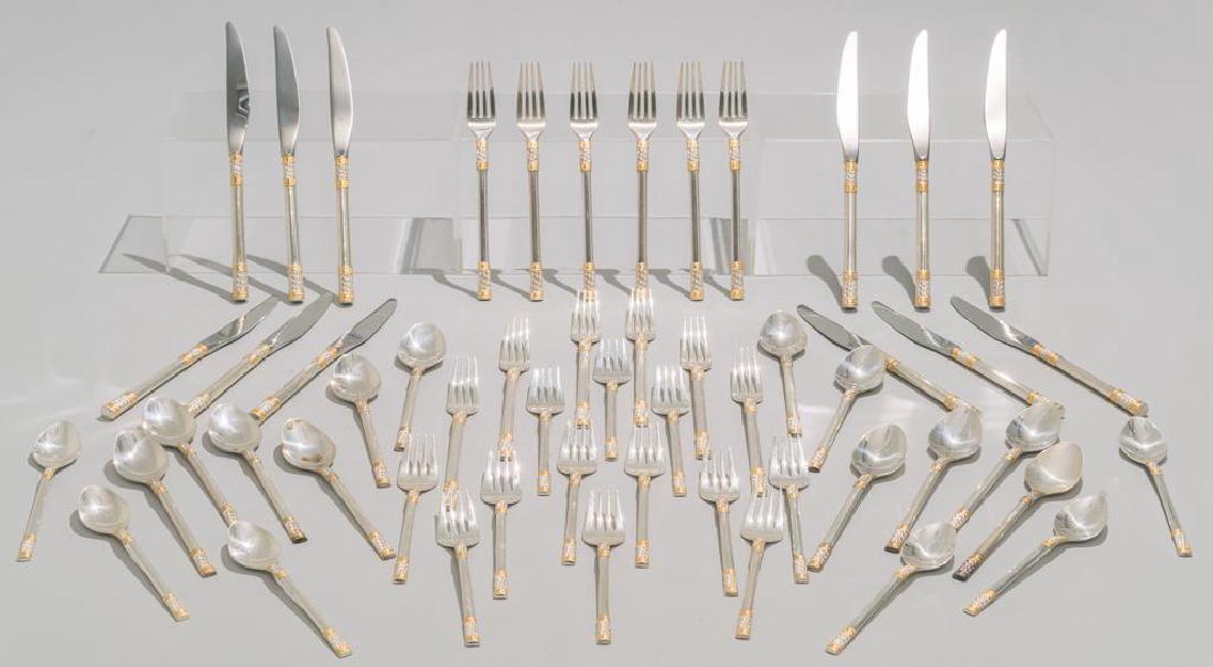 54 Piece Flatware Set 'Golden Aegean Weave' by Wallace: An American sterling silver 54 piece flatware set in the 'Golden Aegean Weave' pattern by Wallace Silversmiths. Includes: 12 x Knives 9.25" 12 x Place forks 7.75" 12 x Salad forks 6.75" 12 x Soup spoo