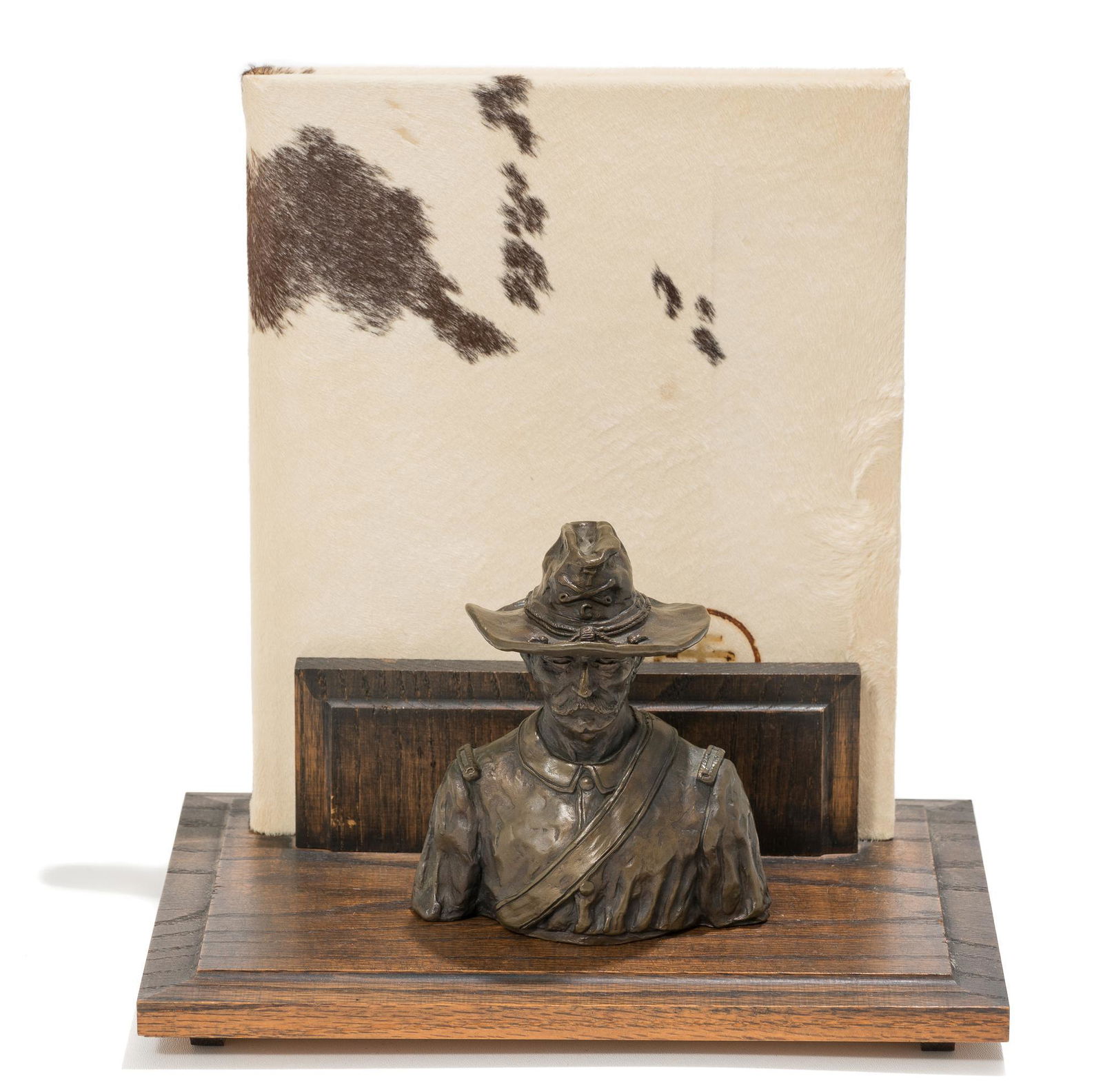 Joe Ruiz Grandee (b. 1929), "Cavalry Officer", 1969,: Joe Ruiz Grandee (b. 1929), "Cavalry Officer", 1969, bronze, ed. 93/126, 6.5 x 5.5 x 4.5"; includes signed book Title: The West Still Lives: A Book Based on the Paintings and Sculpture of Joe Ruiz Gra