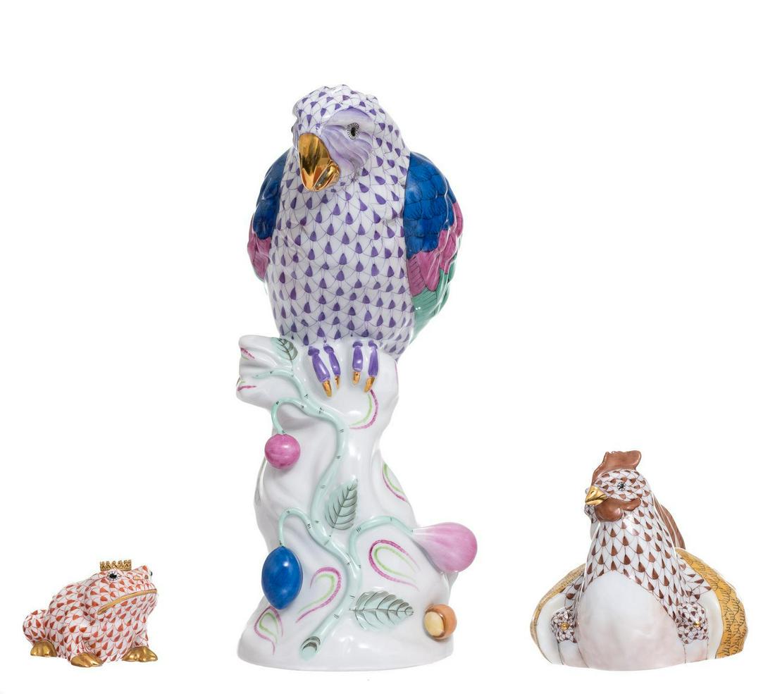 Herend Hand Painted Porcelain Figurines: Herend (Hungary, 20th c.), group of hand painted porcelain figures, each having multicolor accents over a white ground, marked: Herend Hungary, includes: perched parrot, 10 x 4", rooster 6 x 6" &