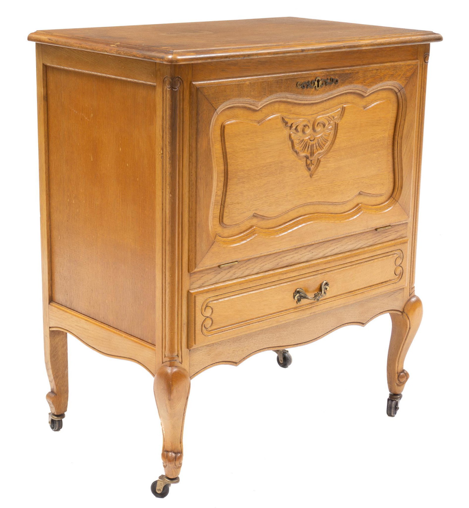 French Drop Front Cocktail Cabinet: French country cocktail cabinet, carved single drop front door opens to shelved interior, above single drawer, includes key, rising on cabriole legs with casters 33.5"h x 28.5"w x 17.5"d State wide de