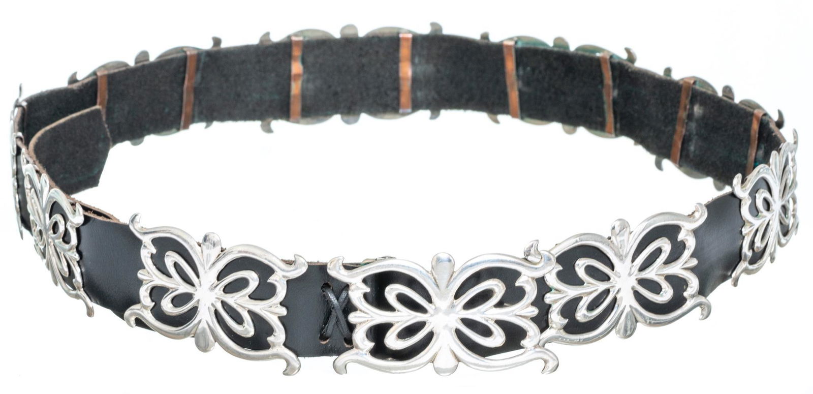 Vintage Sterling Silver Butterfly Concha Belt: Vintage sterling silver concha belt with leather strap, etched butterfly motif length: 48", weight: 265g (including leather) €‹€‹€‹€‹€‹€‹€‹Provenance: An Alamo Heights, T