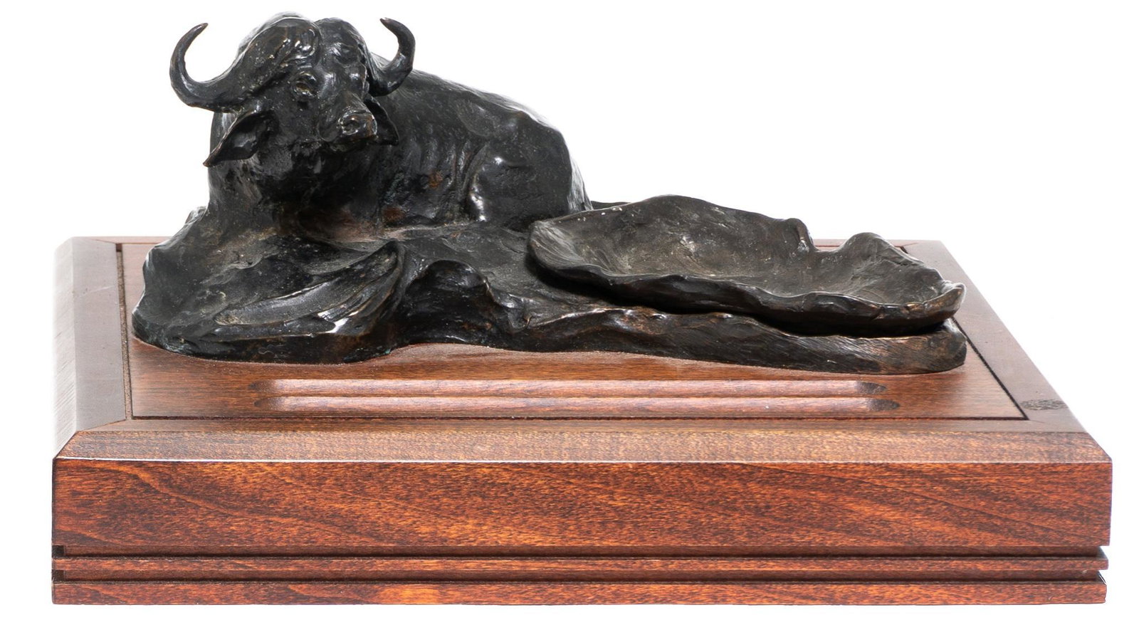 Dennis Anderson (1940-2005), Water Buffalo: Dennis Anderson (1940-2005), water buffalo, bronze and wood pen holder 10 x 10 x 4" Provenance: A Fort Worth, TX Estate Dennis P. Anderson is a realist/impressionist/representational oil painter of wi