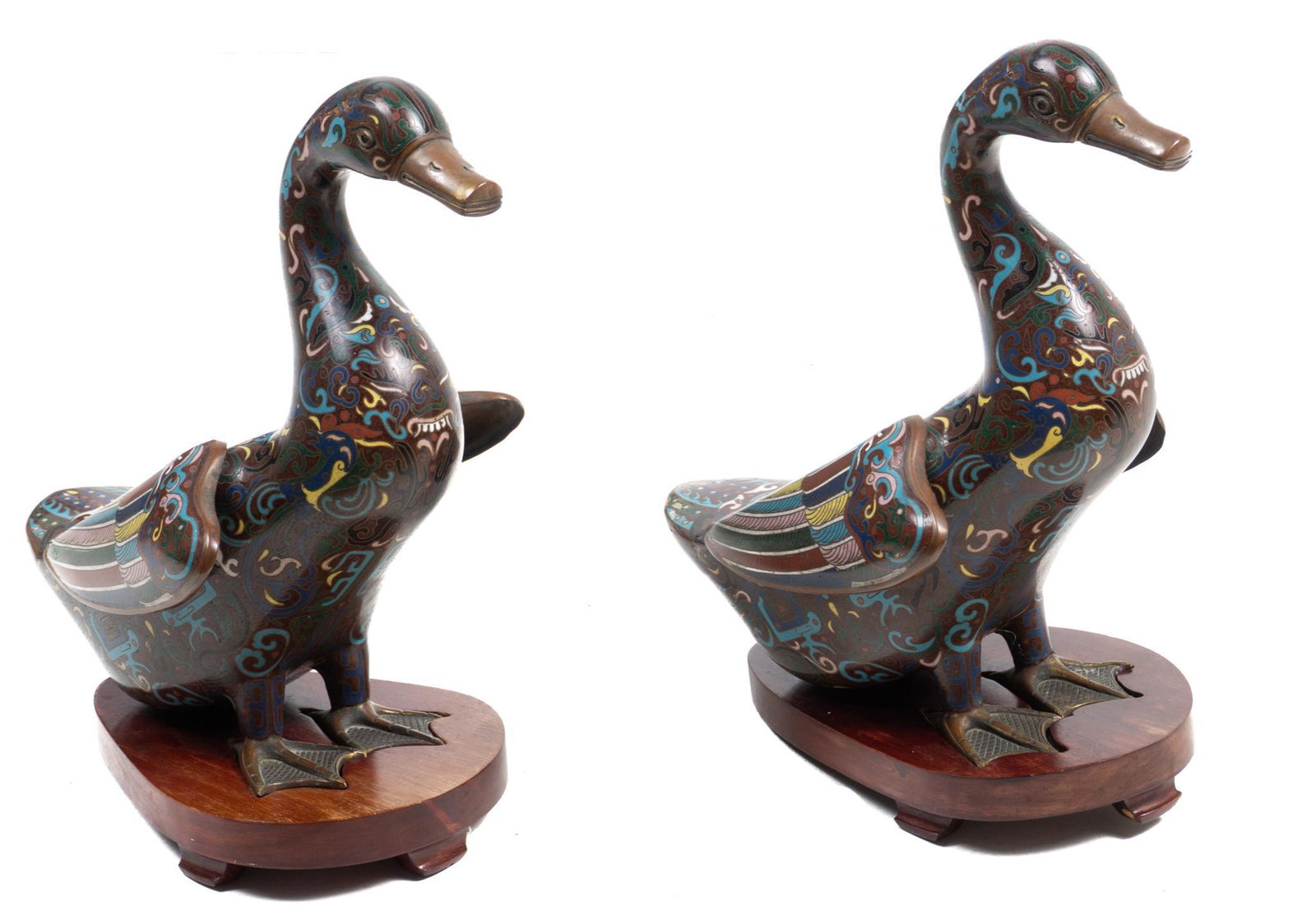 Pair of Chinoiserie Geese Statues: Pair of Chinoiserie cloisonne geese statues, colorful metal frame with wooden base 13 x 6.5 x 11"/ each Provenance: The collection of philanthropist Francie Whittenberg (San Antonio, Texas) We happi
