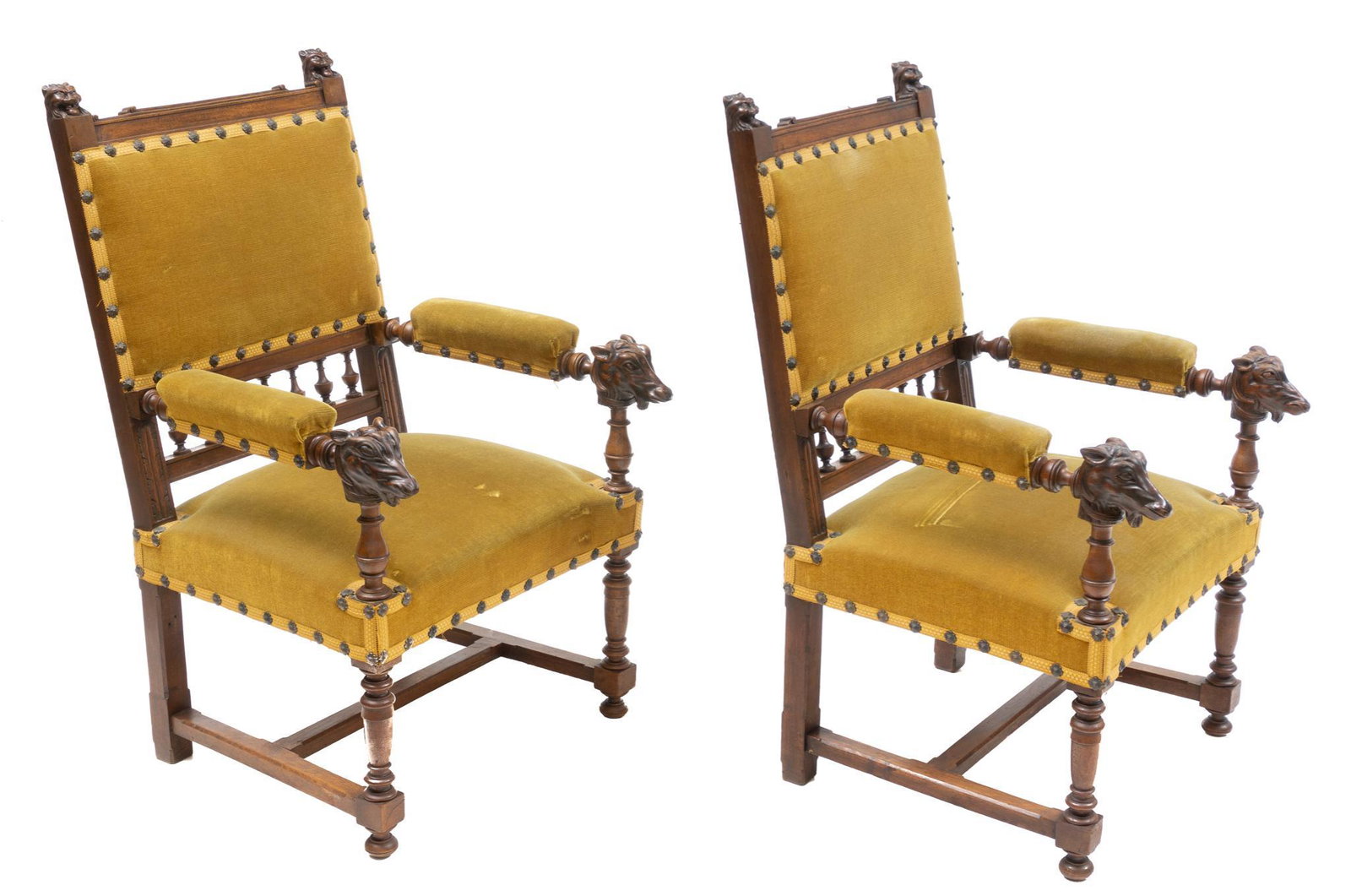 Pair of Henri II Castle Chairs: Pair of French Henri II castle chairs, green upholstery with nail head trim, carved figural wolf arm rests and finials, rising on straight stretchered legs 51 x 25.5 x 22"/ each We happily provide sea
