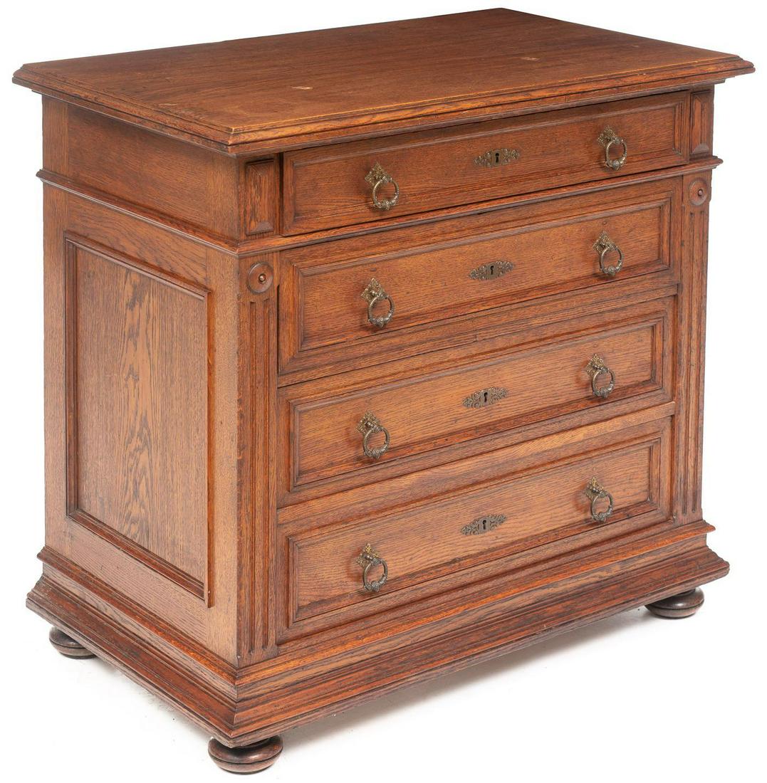 Napoleon III Commode: French Napoleon III commode of four drawers, metal hardware, block front, rising on bun feet 37 x 39 x 24" We happily provide seamless shipping services on everything we sell. Please email us at shi