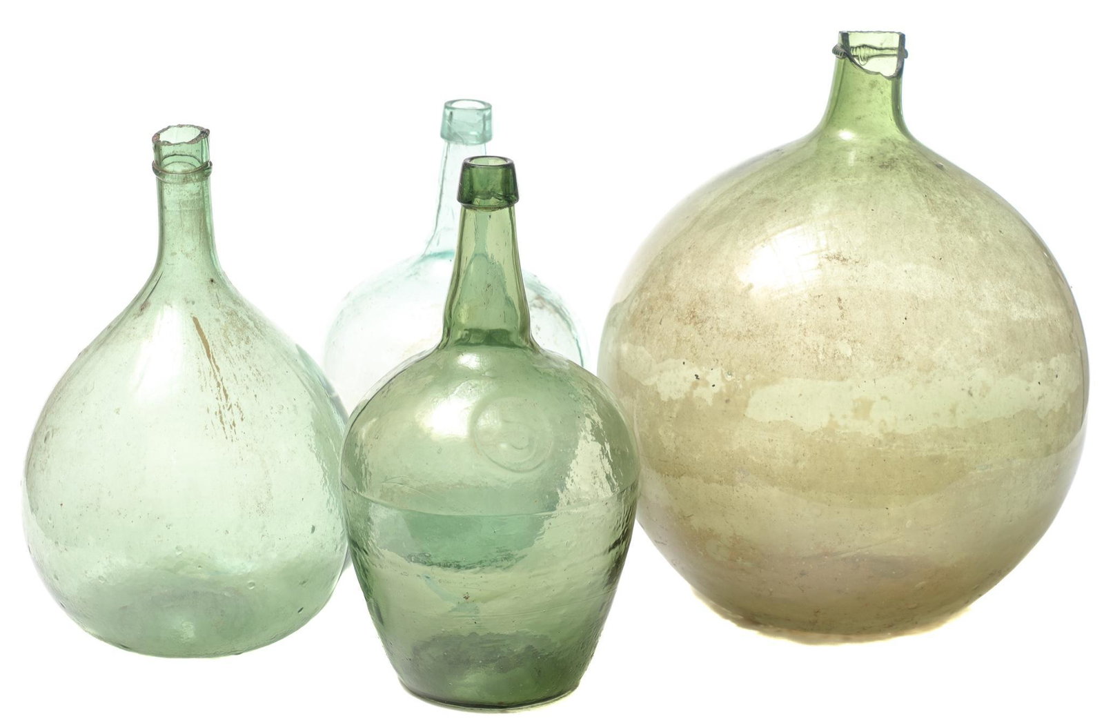 Lot of 4 Vintage Hand Blown Glass Carboys: Lot of four vintage hand blown green and blue glass carboys 17.5 x 12"/ largest We happily provide seamless shipping services on everything we sell. Please email us at shipping@vogtauction.com o