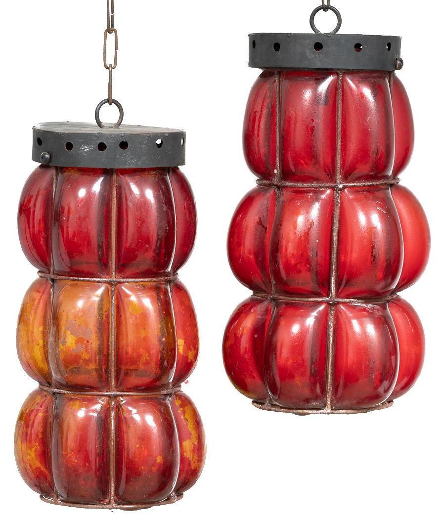 Pair of Vintage Mexican Blown Glass Chandeliers: Pair of vintage metal framed Mexican blown glass chandeliers, red applique over bubble glass 14 x 16";/ each Provenance: The Collection of Chris Hill (San Antonio, TX) We happily provide seamless ship