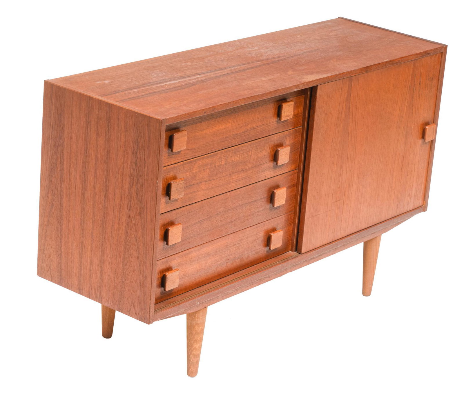 Danish Mid-Century Credenza: Danish Mid-Century credenza cabinet, four drawers beside single sliding door that opens to shelved interior, rising on pin legs 29"h x 48"w x 15"d We happily provide seamless shipping services on ever