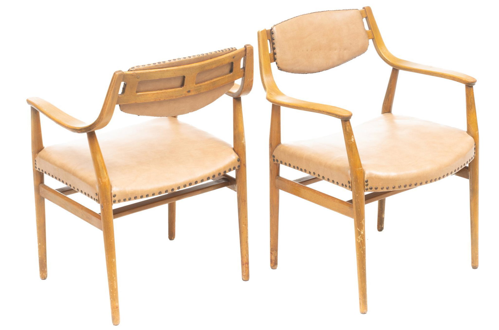 Pair of Danish Mid-Century Arm Chairs: Pair of Danish Mid-Century arm chairs, leatherette seat and back with nail head trim, rising on wooden frame with pin legs 33"h x 25.5"w x 18"d/ each We happily provide seamless shipping services on e