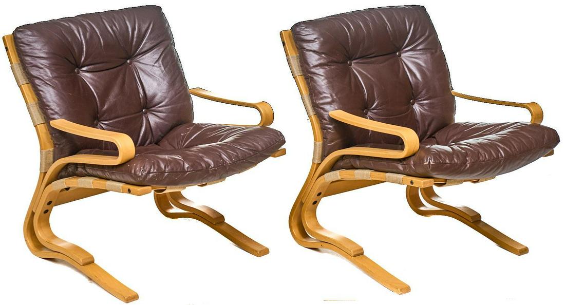 Pair of Danish Mid-Century Leather Arm Chairs: Pair of Danish Mid-Century arm chairs, brown leather, bent wood frame 32"h x 25"w x 28"d/ each We happily provide seamless shipping services on everything we sell. Please email us at shipping@vogtauct