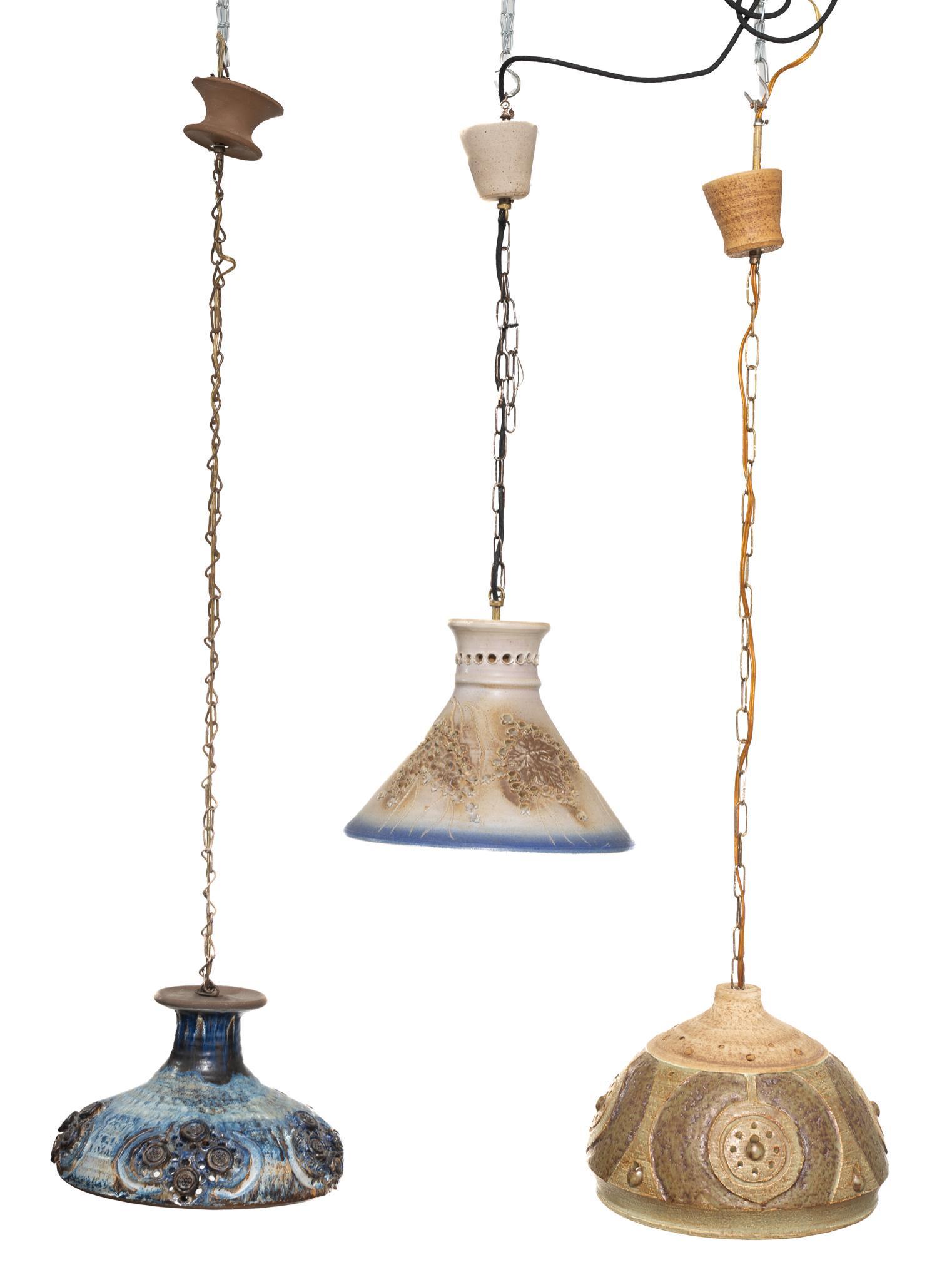 Lot of 3 Danish Mid-Century Pottery Chandeliers: Lot of three Danish Mid-Century hand made potter chandeliers, glazed pottery shades, one signed Chris Haslev, one signed Jeti 10"h x 13"d/ largest We happily provide seamless shipping services on ev