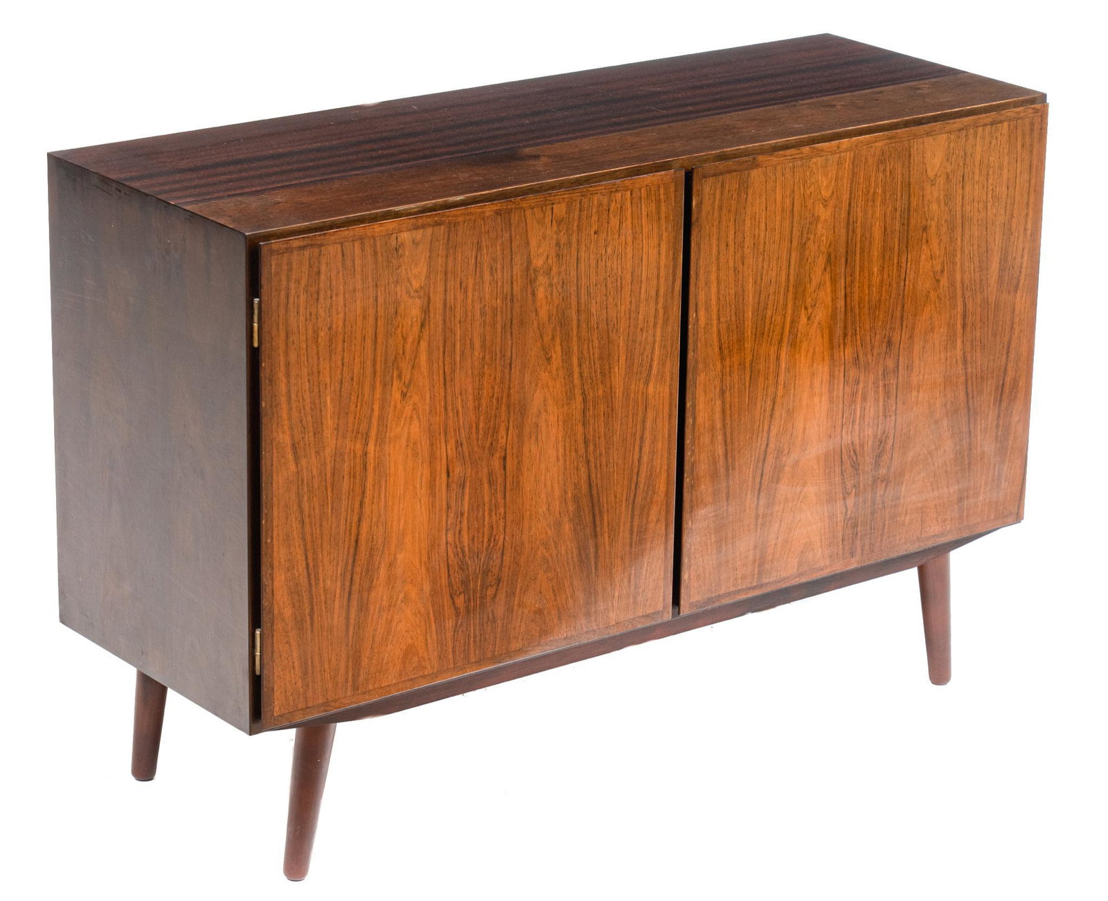 Danish Mid-Century Credenza: Danish Mid-Century credenza cabinet, two doors open to shelved interior, rising on pin legs 31.5"h x 47"w x 17"d We happily provide seamless shipping services on everything we sell. Please email us at