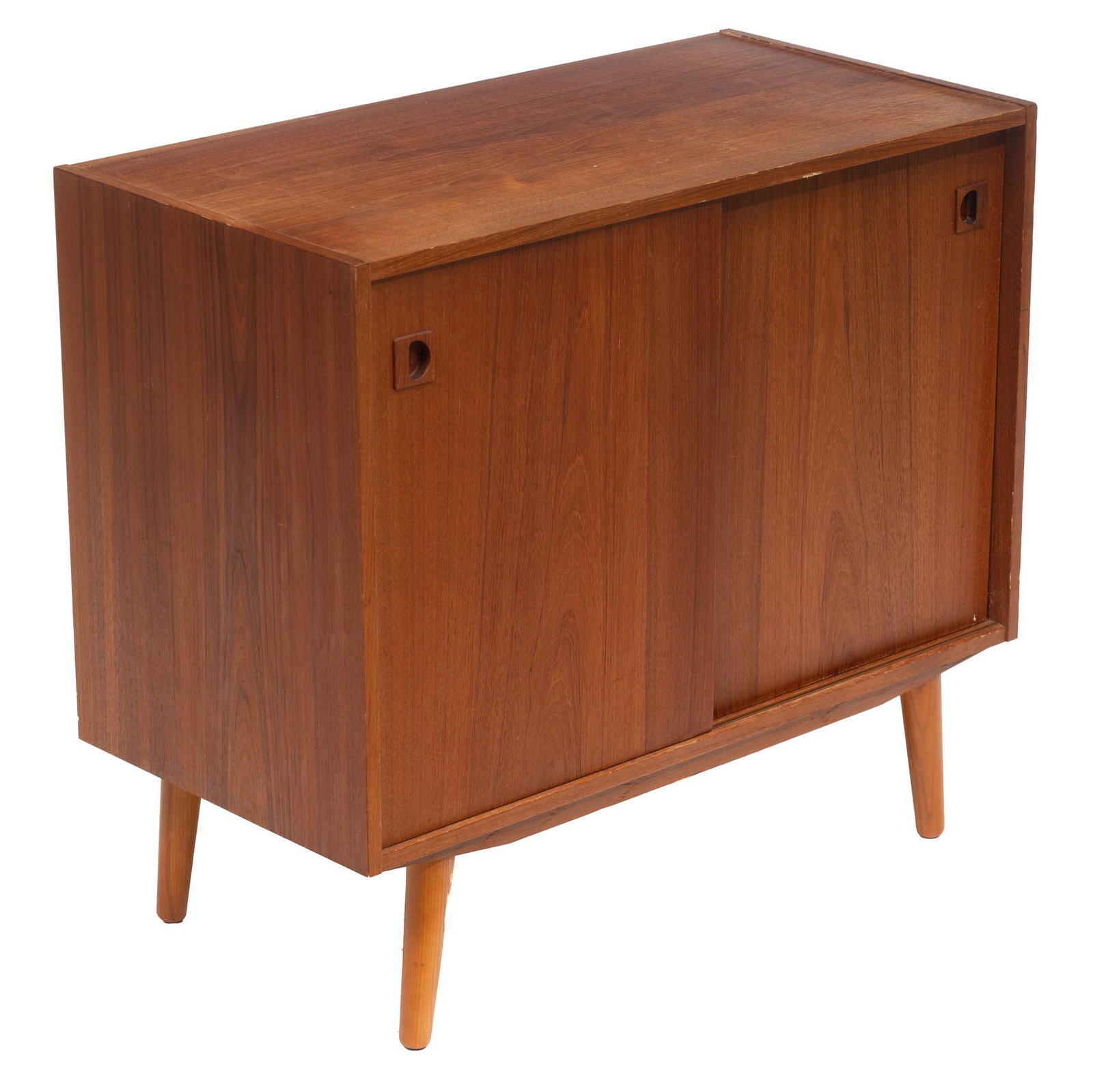 Danish Mid-Century Credenza: Danish Mid-Century credenza cabinet, two sliding doors, rising on pin legs 32"h x 35"w x 18"d Condition: Does not include shelves We happily provide seamless shipping services on everything we sell. P