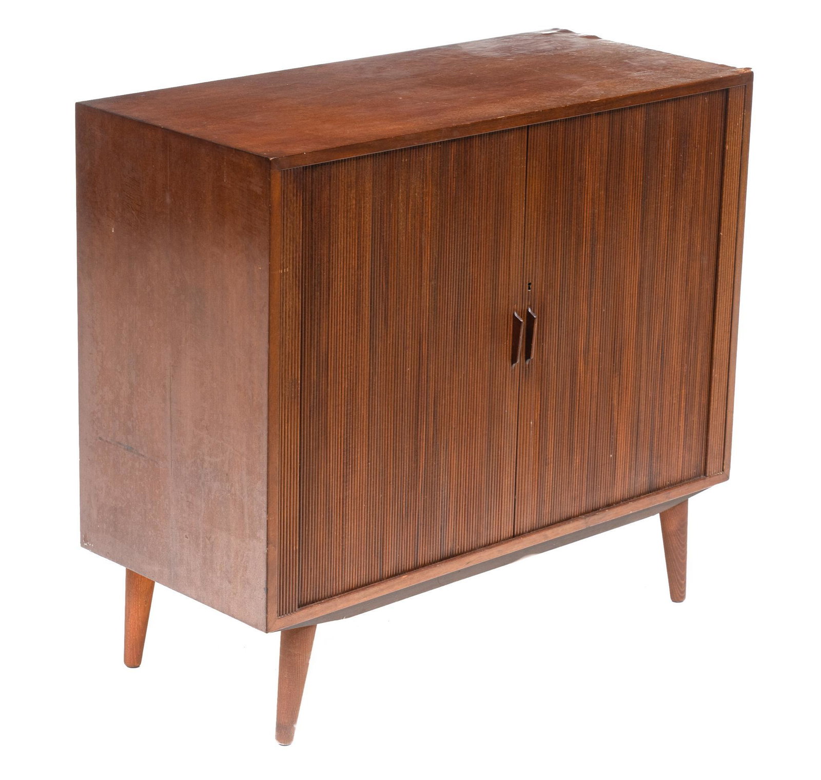 Mid-Century Tambour Front Cabinet: Danish Mid-Century cabinet, two tambour doors open to shelved interior, includes key, rising on pin legs 37"h x 41"w x 18"d Condition: Damage to back and right side We happily provide seamless shippin