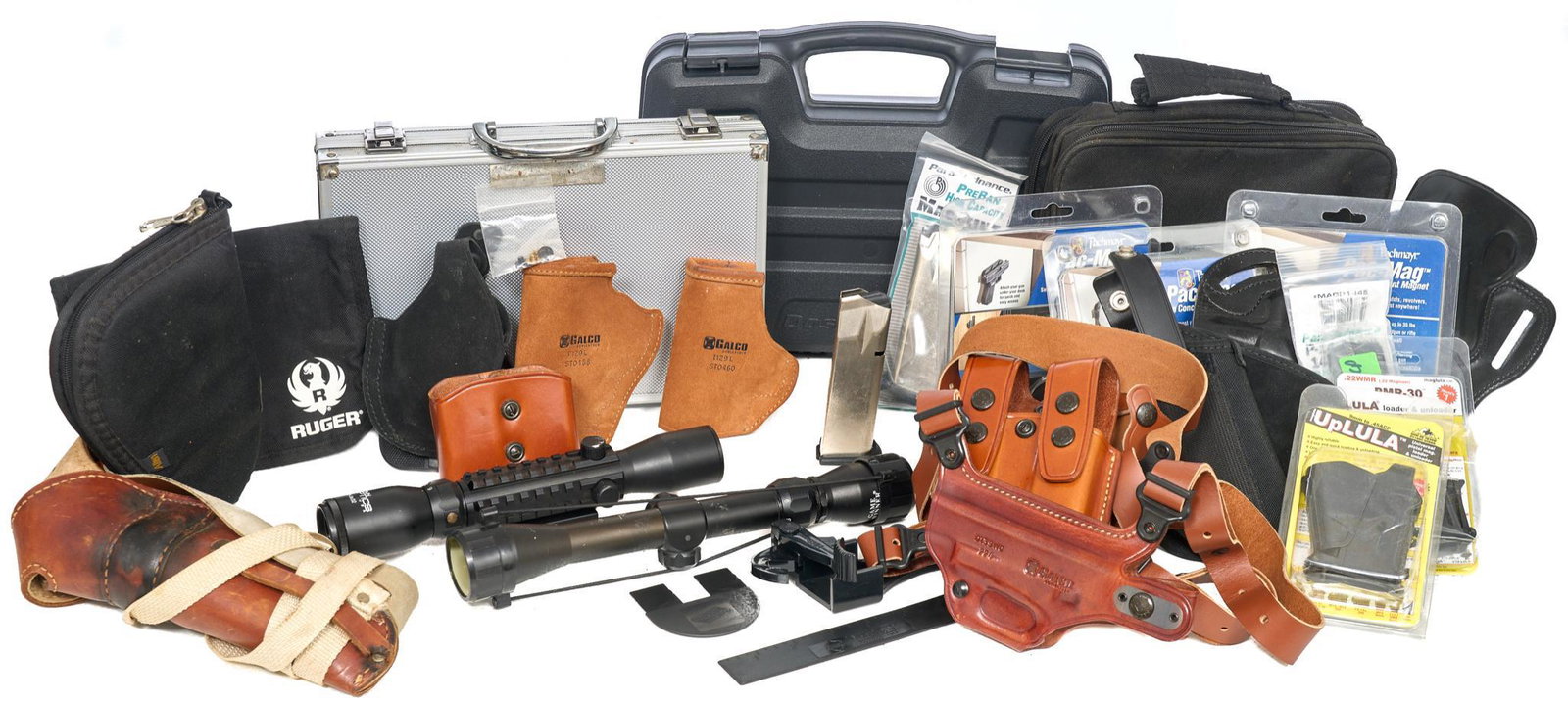Lot of Miscellaneous Gun Accessories: Lot of Miscellaneous Gun Accessories Includes: Sun Optics 3-9x32 Scope, Game Winner 3-9x32 Scope, NcSTAR used gun cleaning kit, 7 x gun holsters, shoulder harness holster w/ mag holder, 3 x packs of m