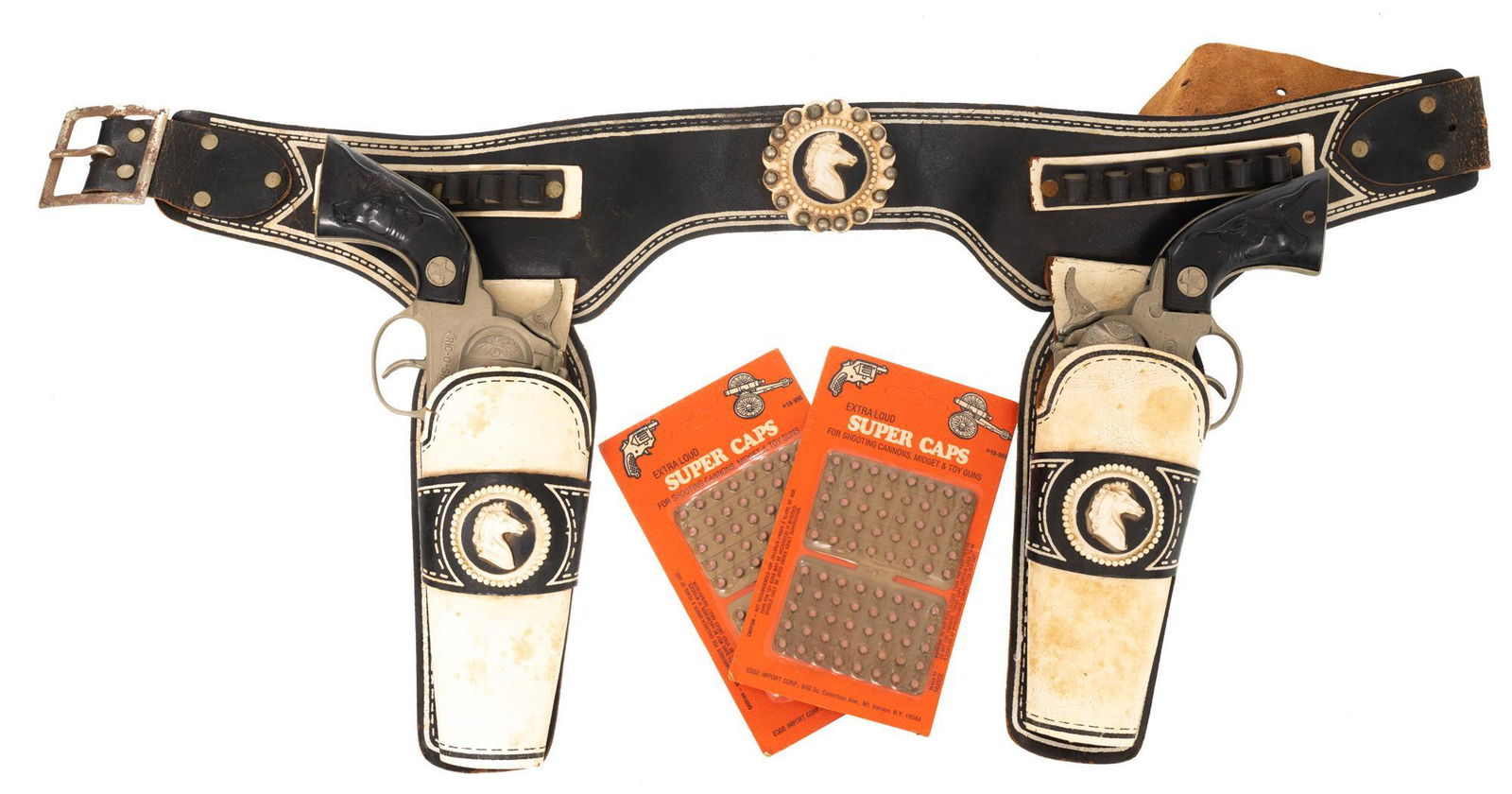 Ric-O-Shay Jr. Cap Gun & Leather Paladin Style Holster: Ric-O-Shay Jr. Cap Gun & Leather Paladin Style Holster Set with 2 vintage unopened packs of caps Condition: Leather has signs of age and wear, some dilapidation; cap guns are in condition consistent