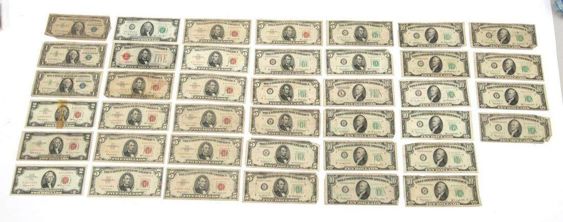 Lot of 40 Circulated US $1, 2, 5, & 10 Bills 1928-1963: Includes: -$1: Series 1957 Blue Seal; Series 1957 A Blue Seal (2) -$2: Series 1953 C Red Seal; Series 1963 A Red Seal (2); Series 1976 regular print -$5: Series 1963 Red Seal small print (10); Series