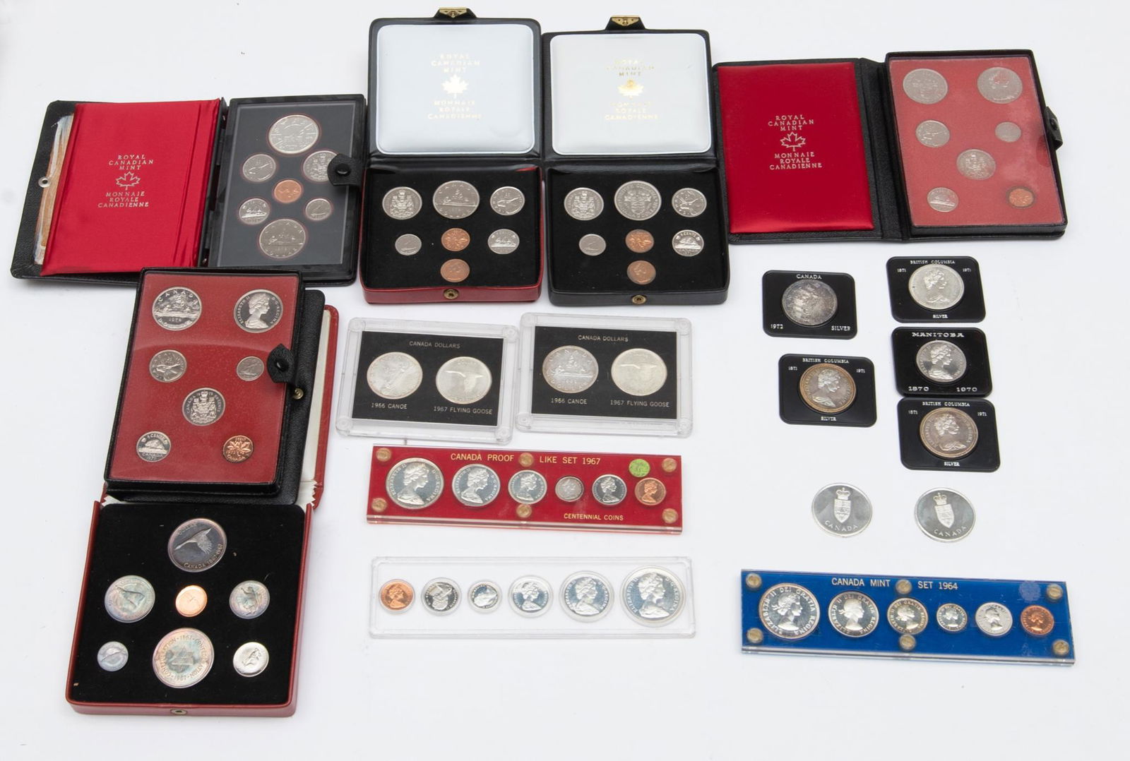 Lot of Assorted 1960s & 70s Canadian Coins & Medals: Includes: 10.34oz. total -1970 Silver Manitoba in case -1971 Silver British Columbia Centennial in case -2 x 1967 Confederation medal in case & box -1972 Silver Canadian Dollar in case & case