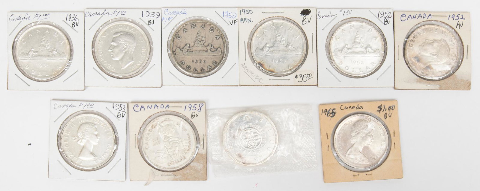 Various Canadian Dollar Coins: Includes: 6oz. Total -(10) Various years Canadian Dollar coins (in individual sleeves) Provenance: Inventory from the now closed Cristina's Jewelry (San Antonio, TX) We will happily provide seamle