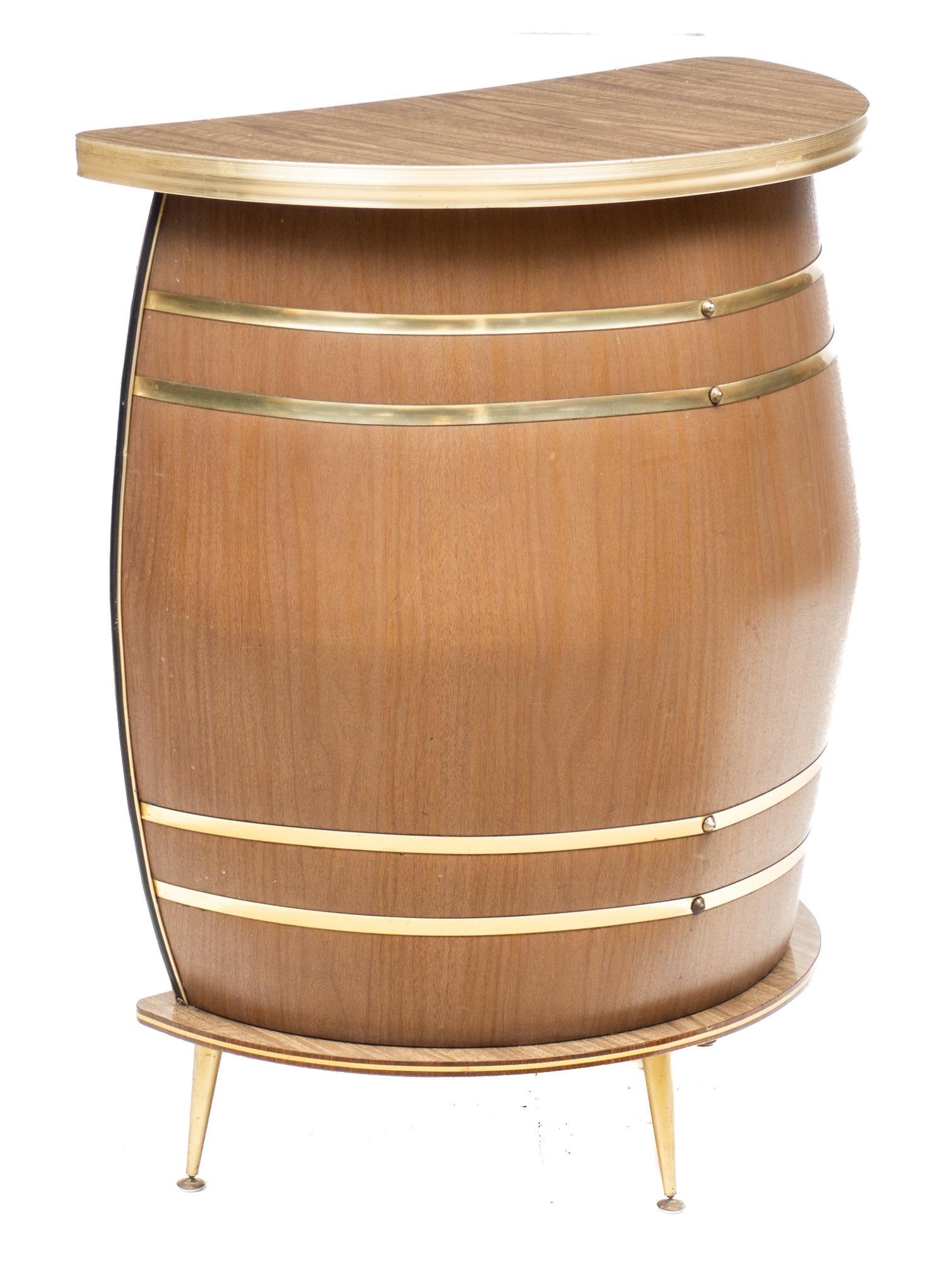 Mid-Century Barget UIL Bar, Barrel Motif: Mid-Century at-home bar, whiskey barrel motif, banded, demilune, with pouring surface, marked Barget UIL London, rising on pin leg base 41.5"h x 33"w x 18"d We happily provide seamless shipping servic