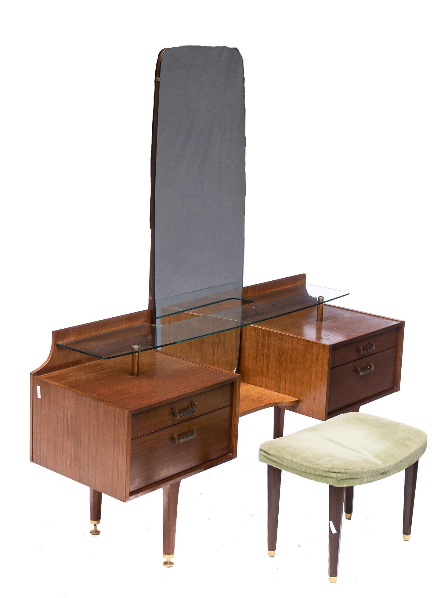Mid-Century G Plan Vanity and Chest: Mid-Century G Plan vanity, arched mirror with four drawers, to include green upholstered stool, metal hardware, and matching chest of four drawers We happily provide seamless shipping services on ever