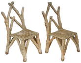 Pair of Carlos Cortes Faux Bois Chairs