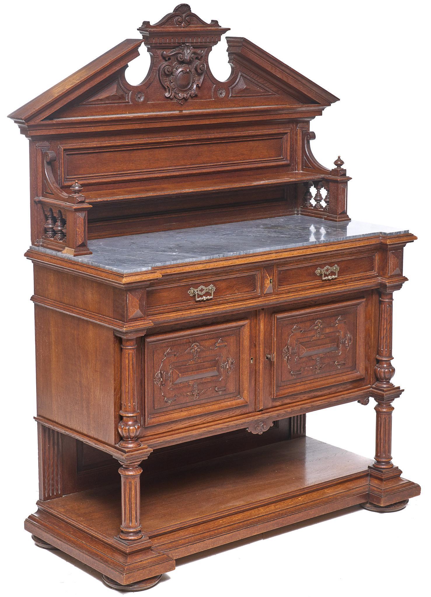 Marble Top Crested Buffet: Buffet cabinet, carved crested mantle above open shelf, green marble, two drawers above two doors, metal hardware, columns above lower tier, rising on bun feet 68.5"h x 50"w x 22.5"d We happily provid