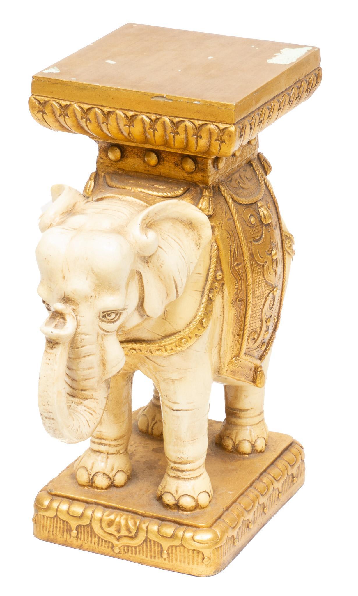 Vintage Plaster Indian Elephant Plant Stand: Vintage colorful plaster plant stand, Indian elephant motif 22"h x 20.5"w x 12"d Provenance: A Dallas, TX Collection We happily provide seamless shipping services on everything we sell. Please email u