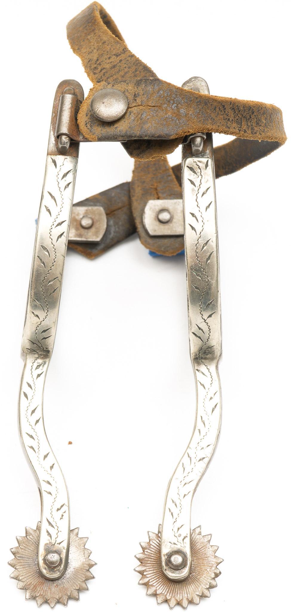 Full Silver Mounted August Buermann Spurs: Full silver mounted and engraved August Buermann spurs Provenance: An Alamo Heights Collection We happily provide seamless shipping services on everything we sell. Please email us at shipping@vogtau