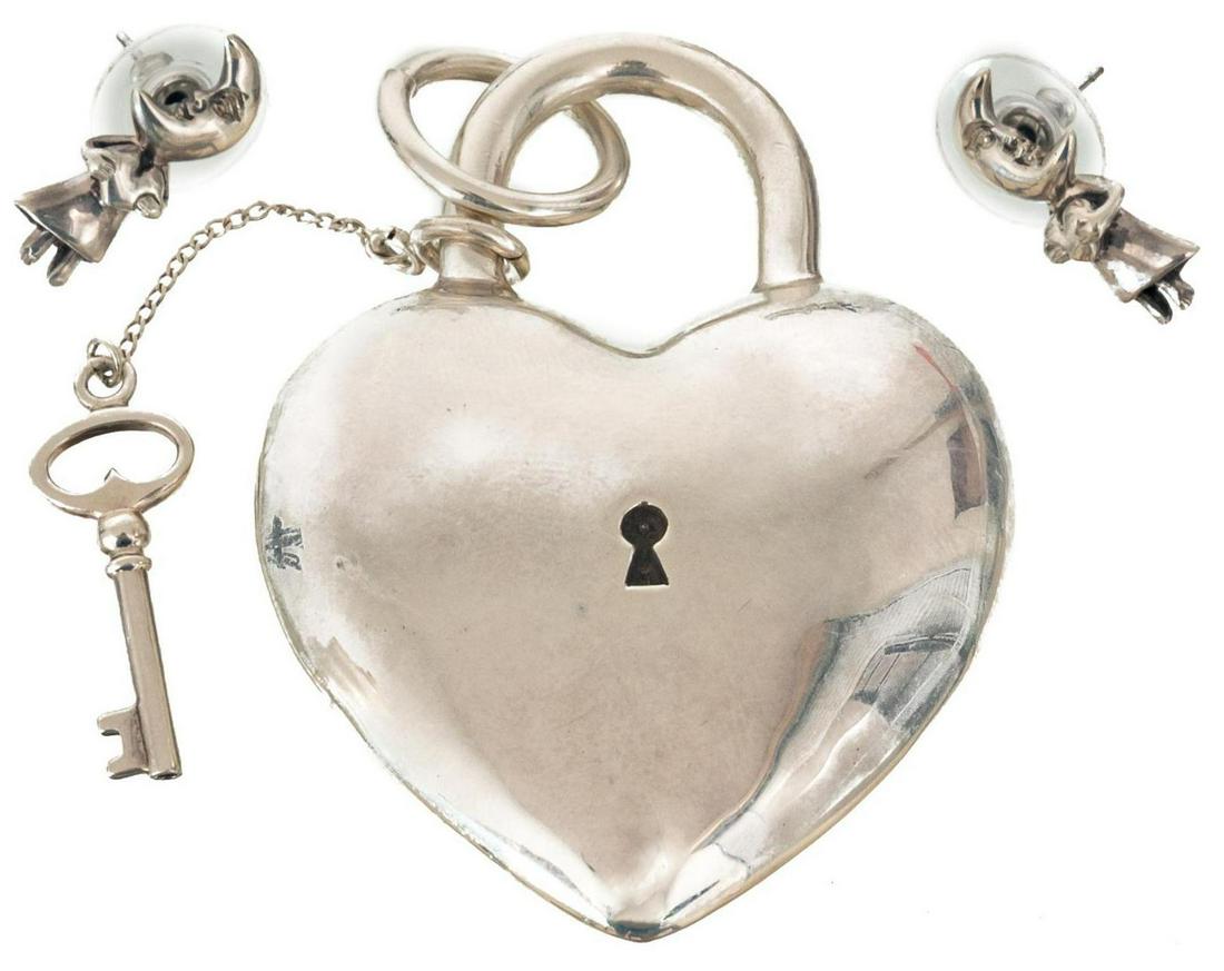 Group of Sergio Bustamante (b. 1949, MEX) Sterling: Group of Sergio Bustamante (b. 1949, Mexico), sterling silver jewelry, hallmarked: Bustamante Sterling, includes: pair of earrings, heart-shaped pendant total weight: 2ozt, 2.375" x 1.75" Provenance: 