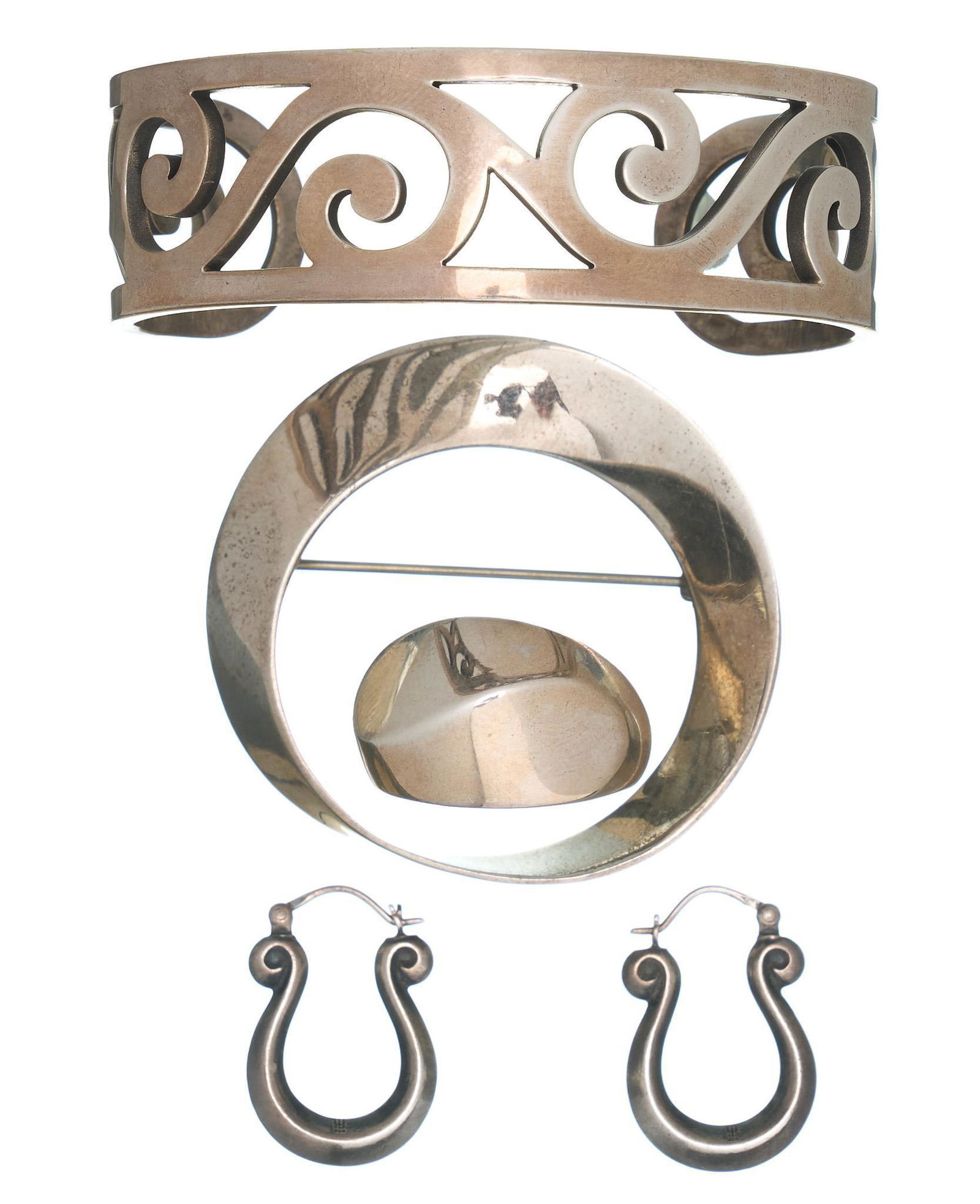 James Avery Sterling Cuff, Bracelet, Earrings: Vintage James Avery sterling silver jewelry set, to include scrolled bracelet, earrings, brooch Ring size: 9 (sizeable), 2 1/4" internal diameter, total weight: 59.6 grams Provenance: Inventory fr