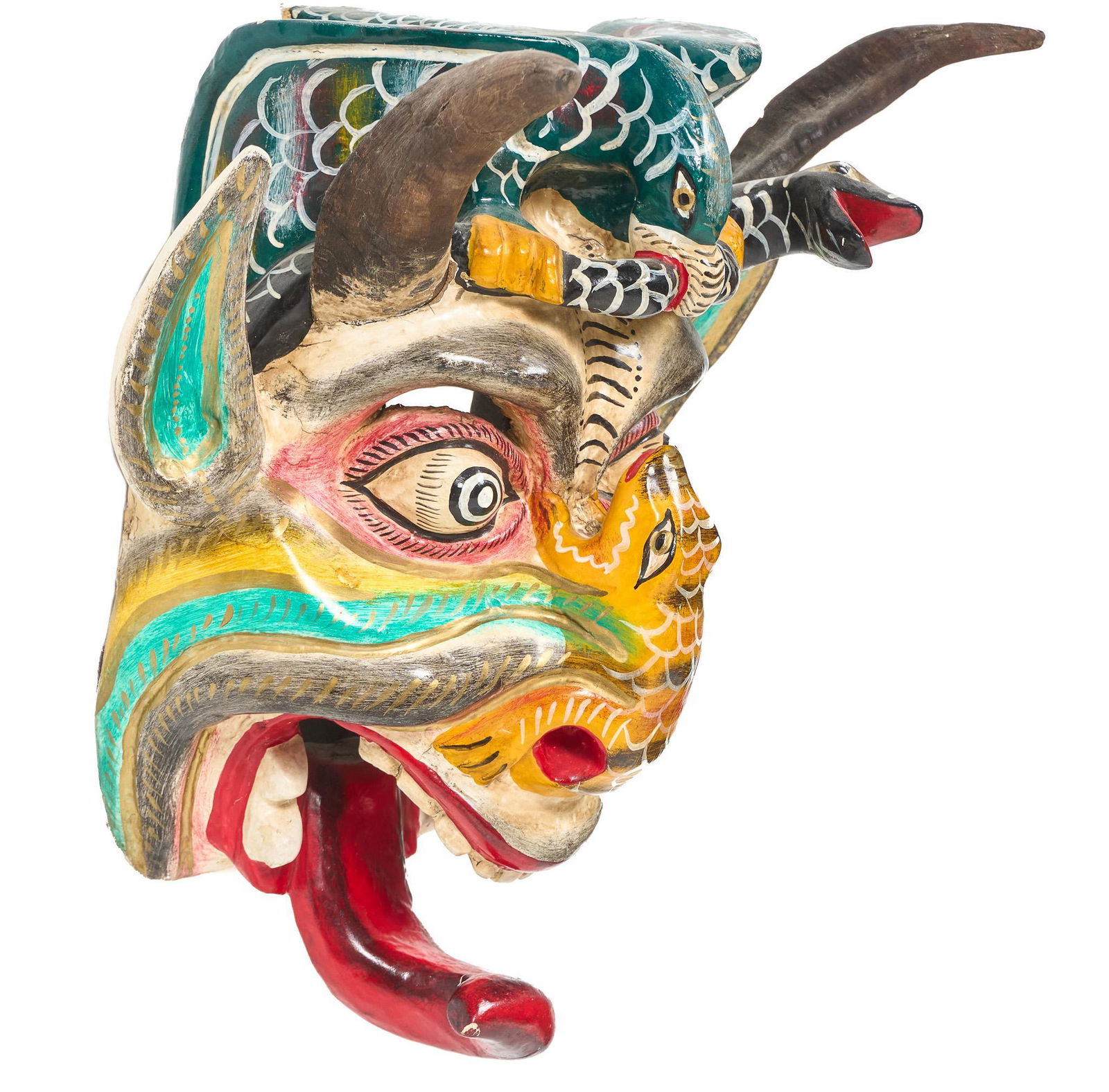 Manner of Jose Rodriguez (20th C., MEX), Folk Art Mask: Mexican folk art mask in the manner of Jose Rodriguez School (20th C., Mexico), depicting a serpent horned devil with flailing tongue, circa 1920s 16"h x 13.5"w x 8"d Provenance: A Hollywood Park, T