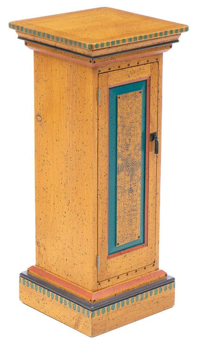 Pedestal: Wooden pedestal, having painted accents with single door that opens to shelved interior 36"h x 15.5"s Provenance: The Estate of Barbara "Babs" Baugh (San Antonio, Texas) We happily pro