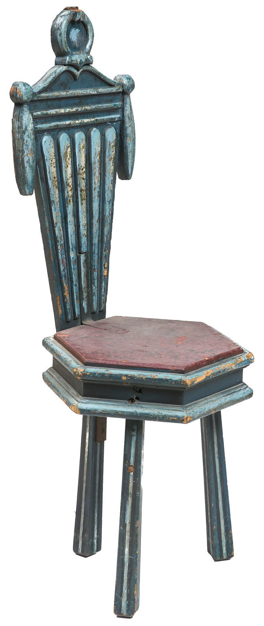Tripod Classical Style Chair Prop: Theatrical prop chair having classical fluted and pedimented back, hexagonal cushioned seat above a tripodal base, measures 44 x 16" â€‹â€‹â€‹â€‹â€‹â€‹â€‹We happily 