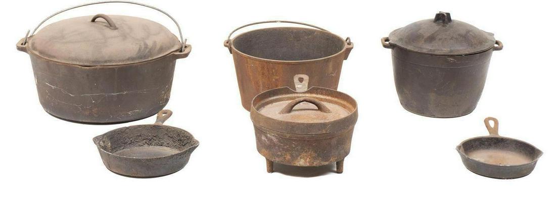 Collection of 6 American Cast Iron Cookingware: Collection of six pieces of American cast iron cookingware, to include skillets, Dutch ovens, pots 14"h x 16"w x 15"d/ largest â€‹â€‹â€‹â€‹â€‹â€‹â€‹Provenance: A San