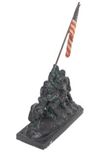 "The Flag Raising on Iwo Jima", Iron: Unknown artist, after Joe Rosenthal's "The Flag Raising on Iwo Jima", iron sculpture with fabric American flag accent 13.5"h x 9"w x 3.5"d Provenance: A Spring Branch, Texas collection We happily prov