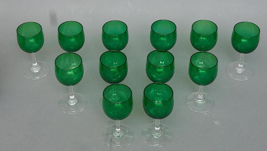 Set of 12 Green Etched Wine Glasses: Set of twelve green and clear glass wine glasses, with etched monogram 4.5"h x 2.5"d/ each Provenance: A Laredo, Texas, collection We happily provide seamless shipping services on everything we sell. 
