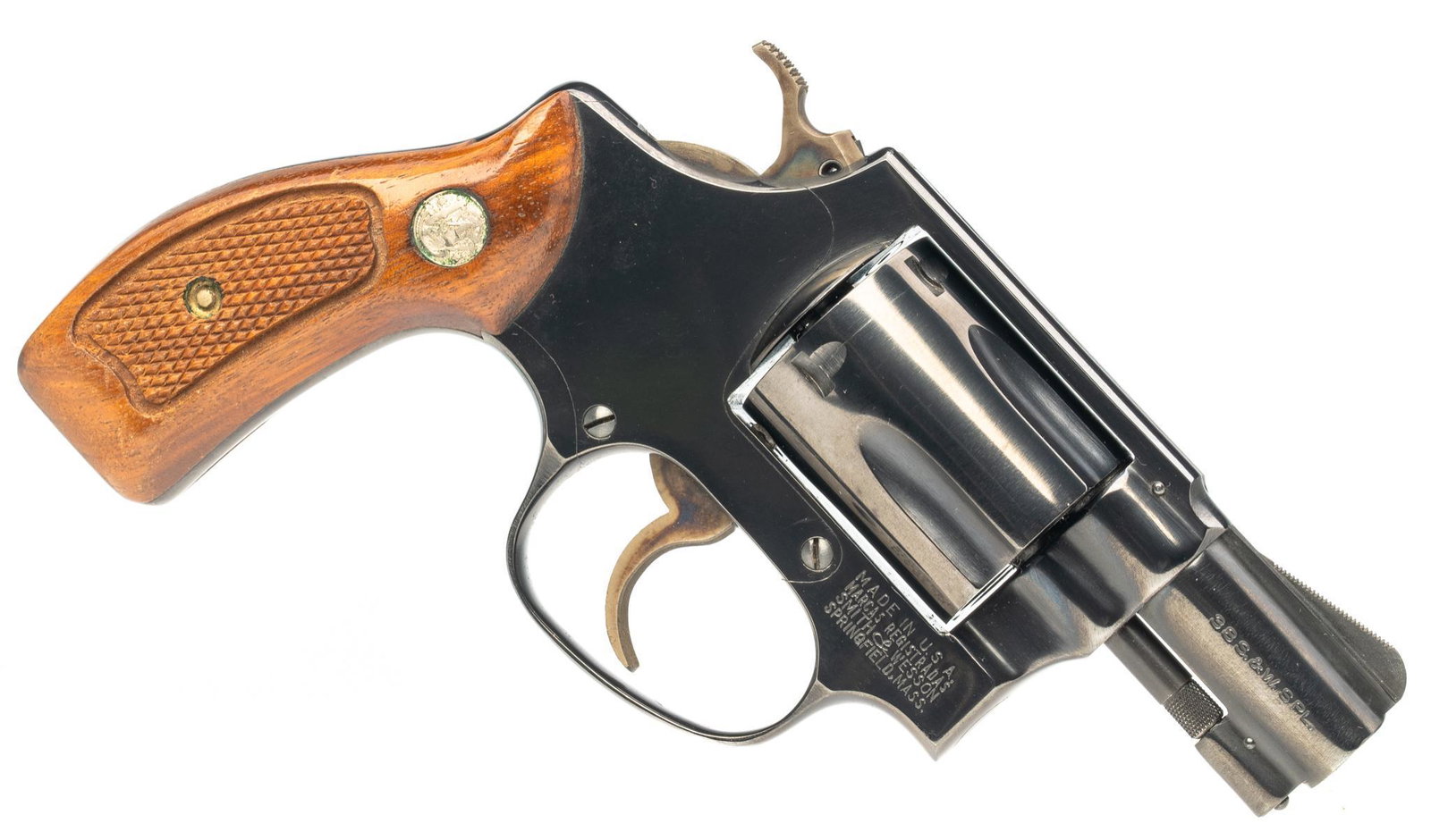 Smith & Wesson Model 36 Chief's Special .38S&W SPL: Serial: 784071 Manufacturer: Smith & Wesson (c.1969) Model: 36 Chief's Special Caliber: .38S&W SPL Barrel length: 1.875" Condition: Very Good; light handling marks in wood grips; verdigris on grip med