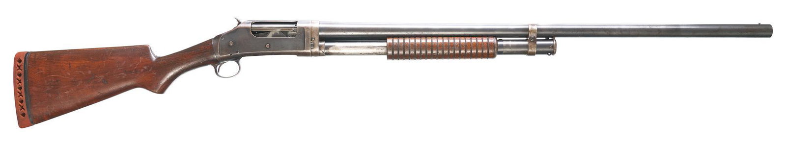 Winchester Model 1897 12-Gauge Pump-Action Shotgun: Serial: 615183 Manufacturer: Winchester (c.1916) Model: 1897 Caliber: 12 Ga. Barrel length: 29" (full choke) Condition: Fair; wood stock is commensurate w/ age & use; barrel & receiver has 80+% blue f
