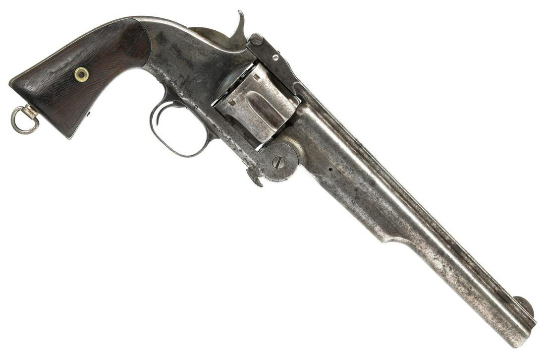 Smith & Wesson Model 3 American .44 S&W Revolver: Serial: 12221 Manufacturer: Smith & Wesson (c.1872) Model: 3 American Second Model Standard Caliber: .44 S&W Barrel length: 8" Condition: Fair; wood grips have been crudely checkered w/ light handling
