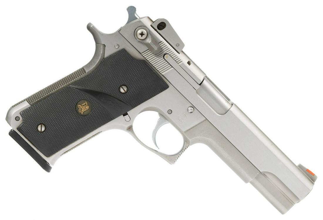 Smith & Wesson Model 645 .45ACP Semi-Auto Pistol: Serial: TBL9107 Manufacturer: Smith & Wesson (c.1988) Model: 645 Caliber: .45ACP Barrel length: 5" Condition: Good; Pachmayr grips have light handling marks; frame & slide have handling marks througho