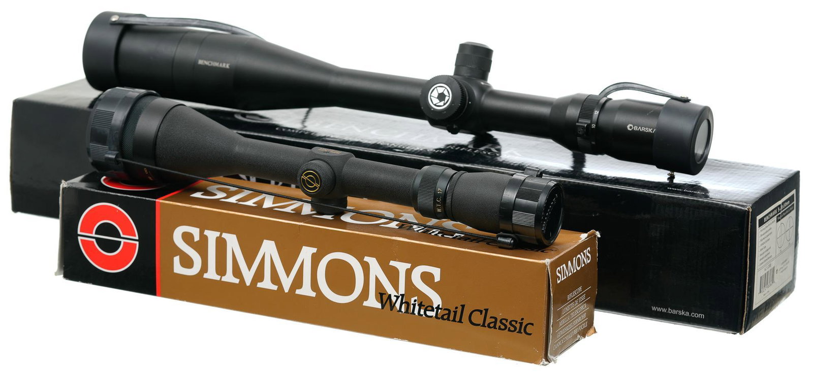 Pair of Rifle Scopes: Barska & Simmons: Includes: -Barska Benchmark 5-20x50 scope w/ box & papers; used w/ handling marks -Simmons Whitetail Classic Model WTC17 4-12x44mm black granite finish scope w/ box & papers; appears new in box (NIB) 