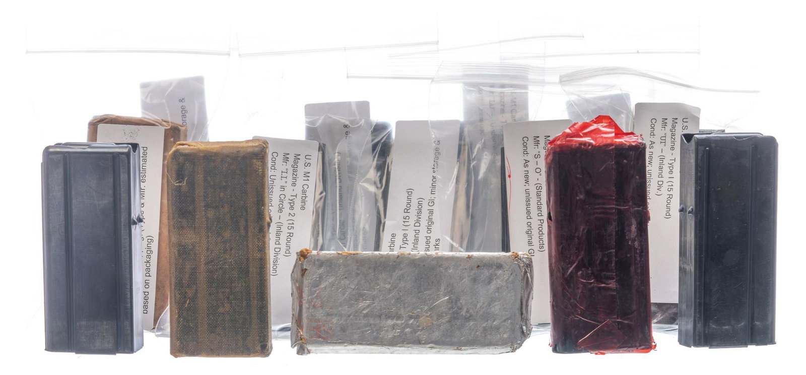Lot of 14 U.S. M1 Carbine Magazines: Includes: -Type I (15-rd): UI (Inland Division); unissued original GI -Type II (15-rd): S-O (Standard Products); unissued original GI -Type I (15-rd): SP (Standard Products); unissued original GI -Typ