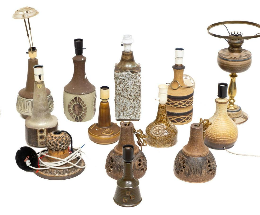 Collection of 13 Danish Mid-Century Pottery Lamps: Collection of thirteen Danish Mid-Century pottery lamps, featuring glazed and perforated accents, some signed, to include Mich Anderson & Son, Axella, Darthol, Chris Haslev, etc 6"h x 5"w/ larges