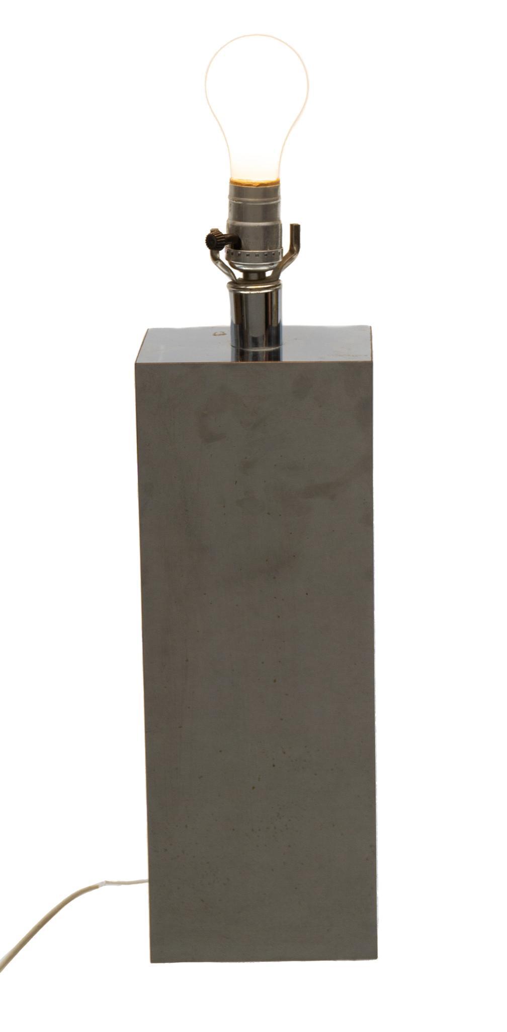 Kovacs Chrome Lamp Plinth Stand: Chrome lamp base by Kovacs design 20"h x 6"w x 4.5"d Provenance: The Estate of Mary Ann Delmer, Alamo Heights, Texas We happily provide seamless shipping services on everything we sell. Please emai