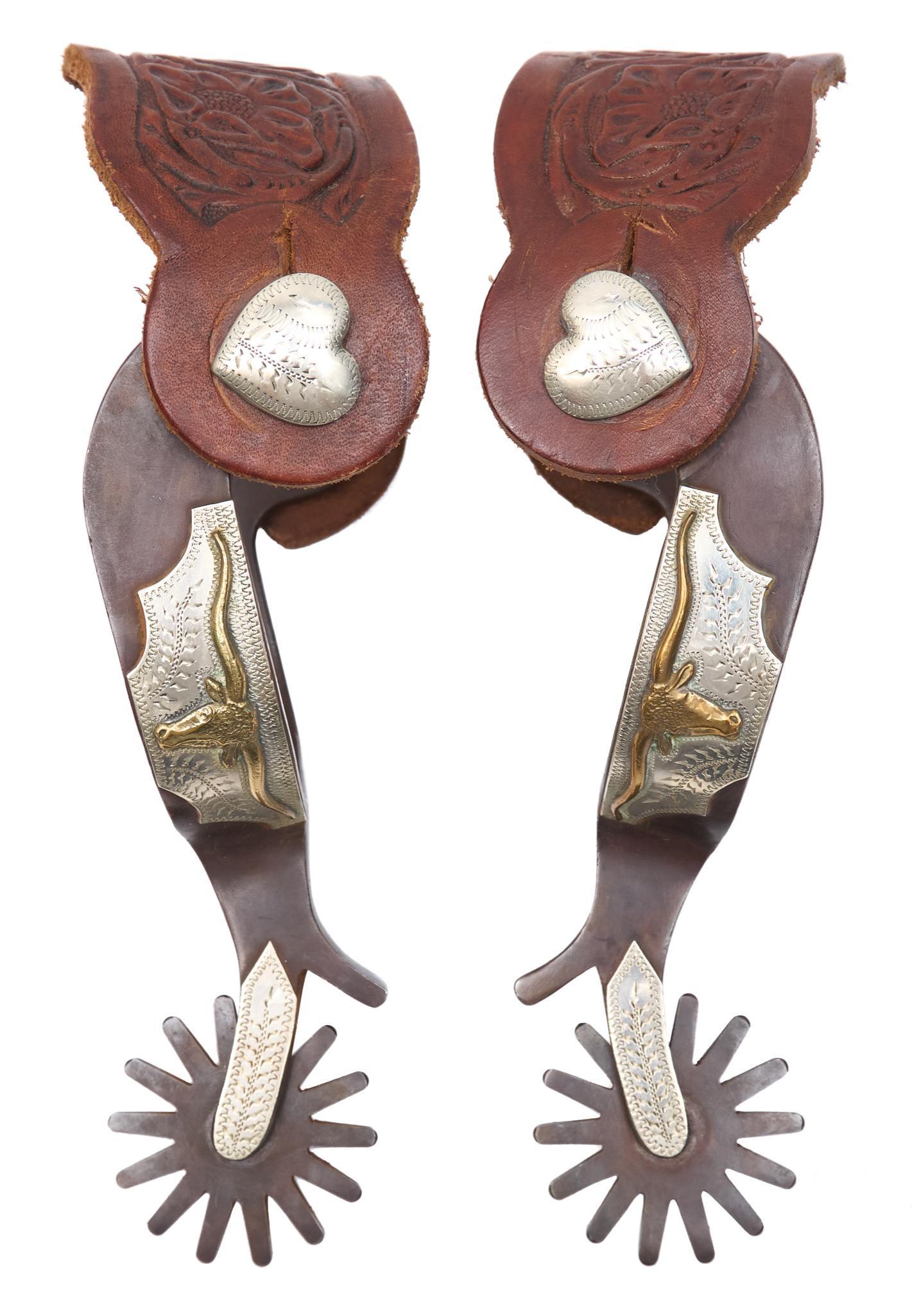 Bill Rogers "Texas Longhorn" Double Mounted Spurs: Bill Rogers makers marked "Texas Longhorn" patterned spurs, being double mounted in copper and silver, unused condition 9"w x 3"d/ each Provenance: An Alamo Heights, Texas collection We happily provid